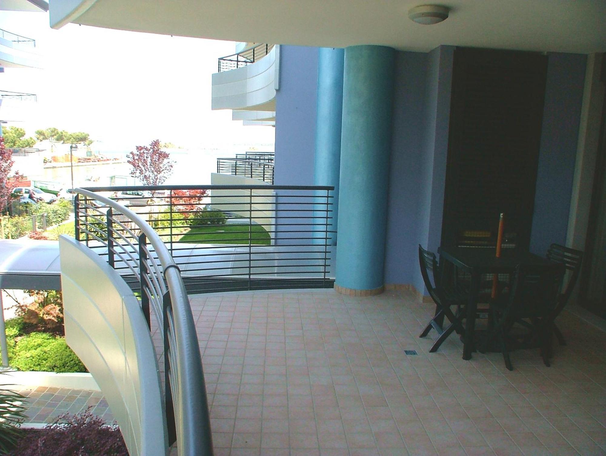 Costa Azzurra Apartment Градо Номер фото
